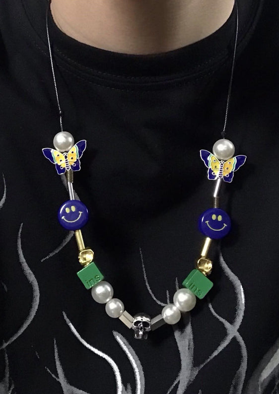 Evae+ x ctrlaltdelete smiley skull necklace